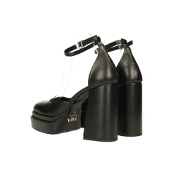 Décolleté glitterate con doppio plateau. Made in Italy. Tacco alto 11cm