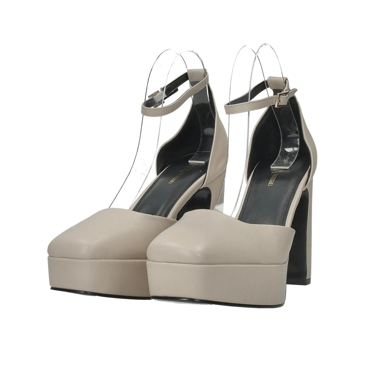 Décolleté in vernice con cinturino. Tacco alto 10cm