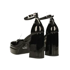 Décolleté in vernice con doppio plateau. Made in Italy. Tacco alto 11cm