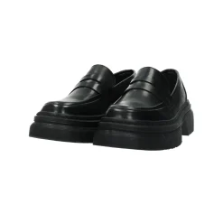 Mocassini con suola dentellata. Tacco alto 4cm