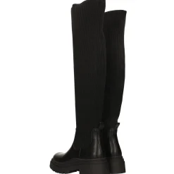 Stivali marroni con tomaia in tessuto elasticizzato. Tacco alto 5cm