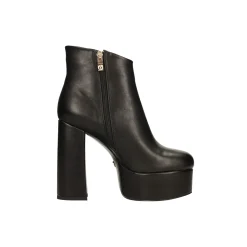 Tronchetti plaftorm in vernice. Tacco alto 13cm